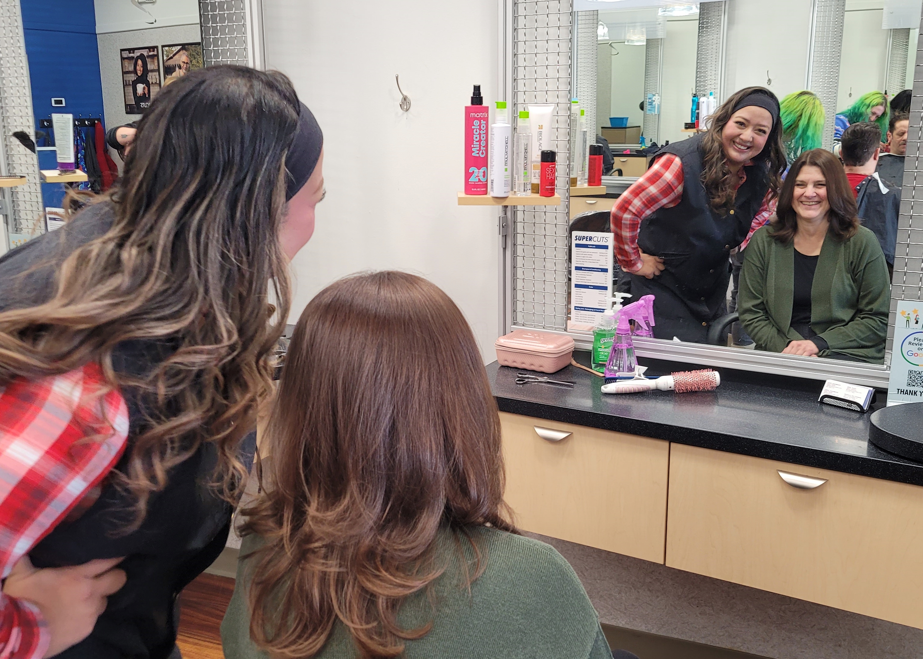 Stylist and guest in salon